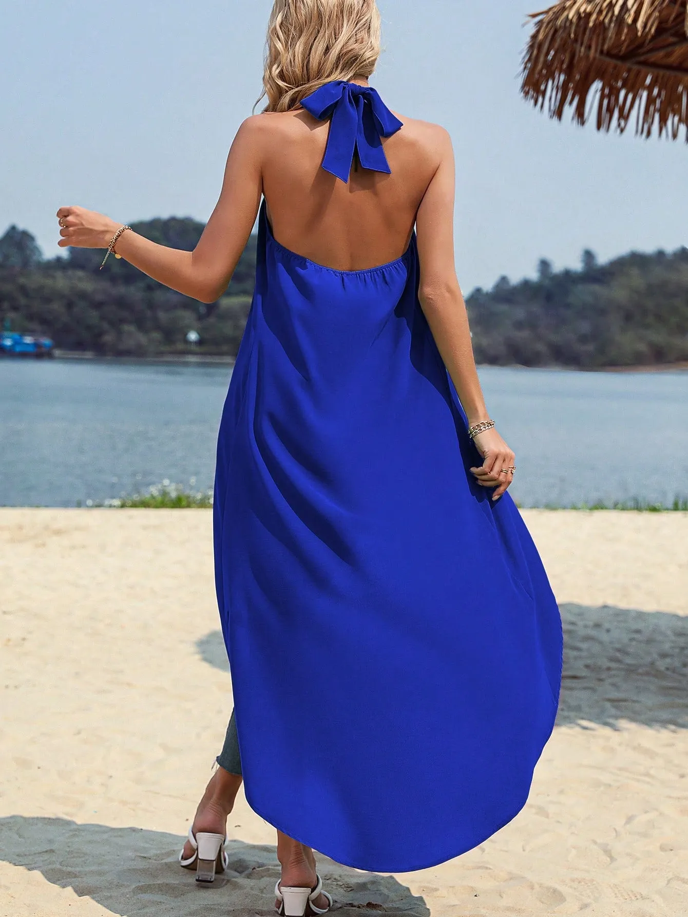 Solid Asymmetrical Hem Halter Top
